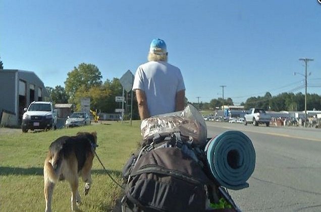 man and his dog walk 1200 miles for cancer and you can help