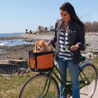 pedal pooches ride snug and comfy in hip dog bike baskets