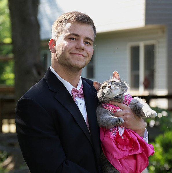 teen takes his cat to the purrom